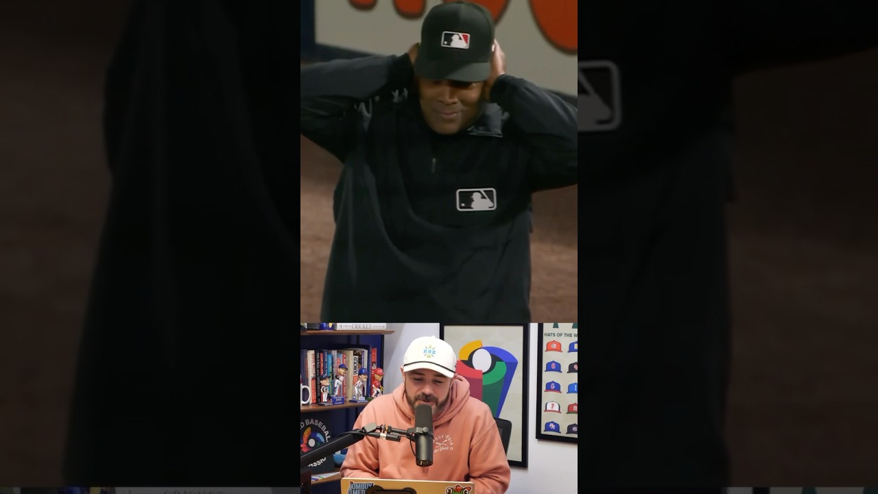 Yankees fans boo the umpire after he realized the net was too high to throw a ball over, a breakdown