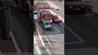 Ignorant Driver Blocks Fire Truck.