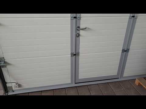 Видео: Какво представлява надземната гаражна врата?