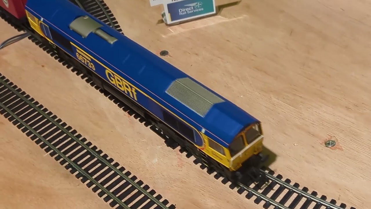 OO Gauge Pendolino and GBRf Class 66 Diesel train in action.