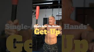 Single-Arm Club Getup (64yrs) #getup #heavyclubs #steelclubs #shorts