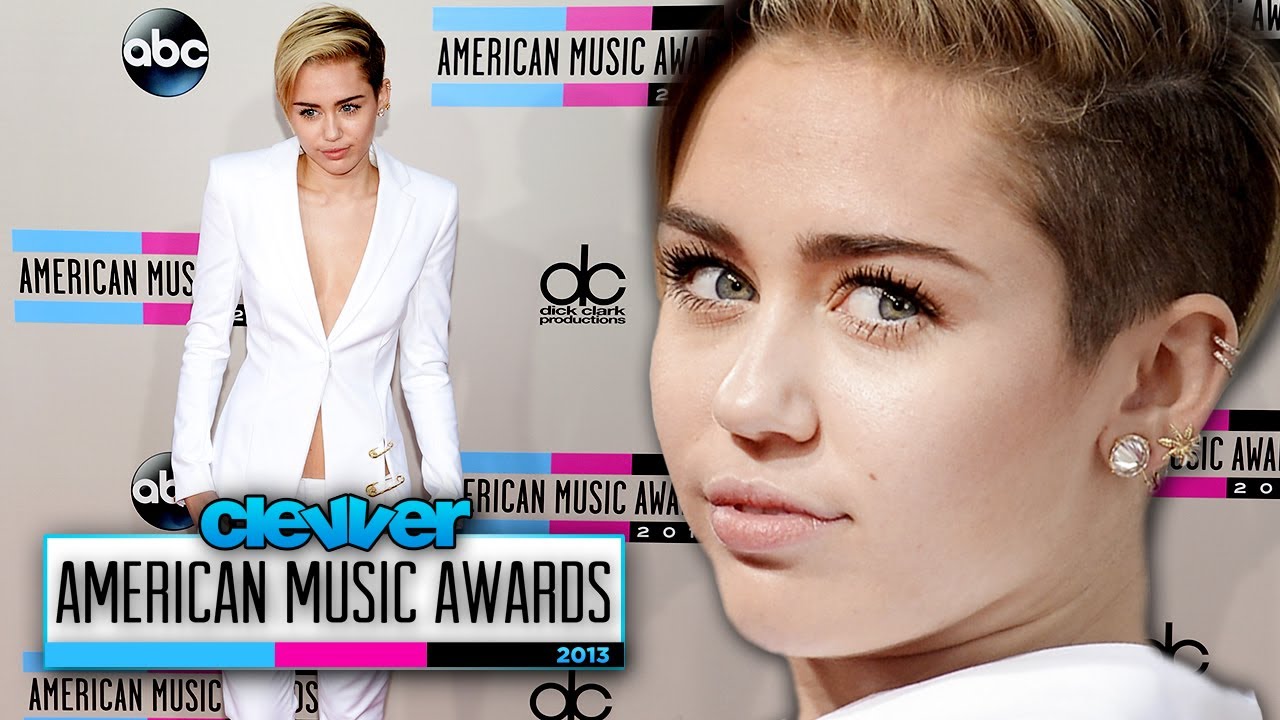 miley cyrus red carpet recent Miley Cyrus Glows in White Pant Suit at American Music Awards 2013