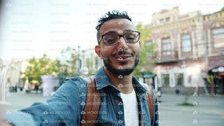 Pov Of Young Arab Making Online Video Call Talking Looking At Camera Outdoors