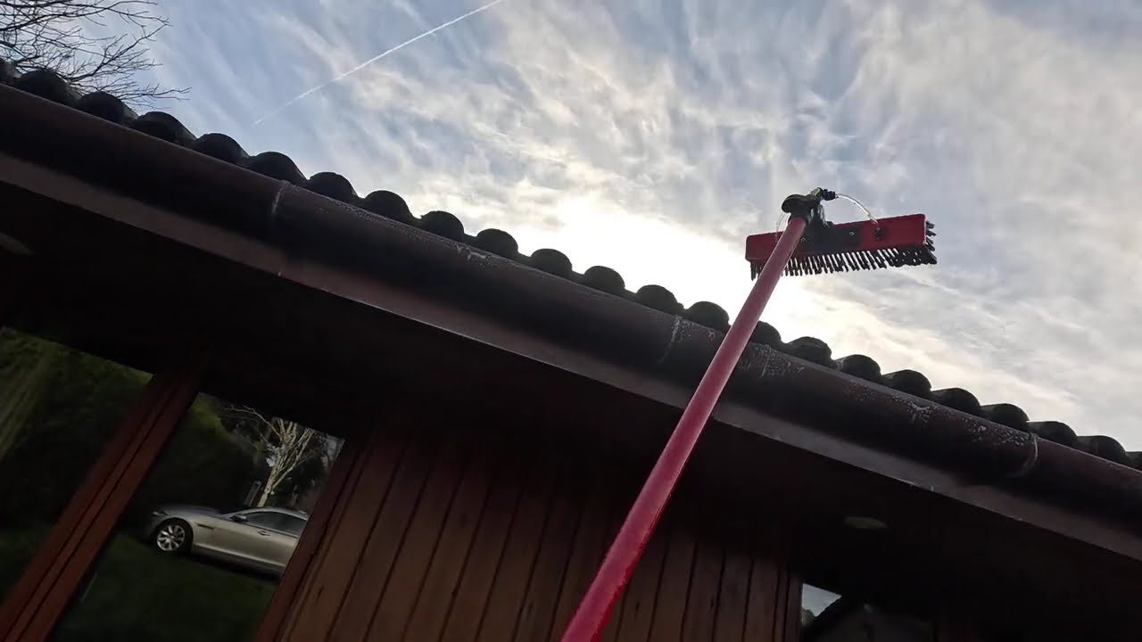 Freshening up thirty year old UPVC gutters and wooden fascia near Lanark, Scotland.\