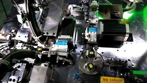Automatic EE core assembly, taping & testing machine. newwinhk@hotmail.com