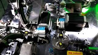 Automatic EE core assembly, taping & testing machine. newwinhk@hotmail.com