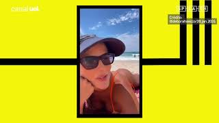 Deborah Secco enjoys the beach with her daughter and shows off her bikini-clad backside in a video.