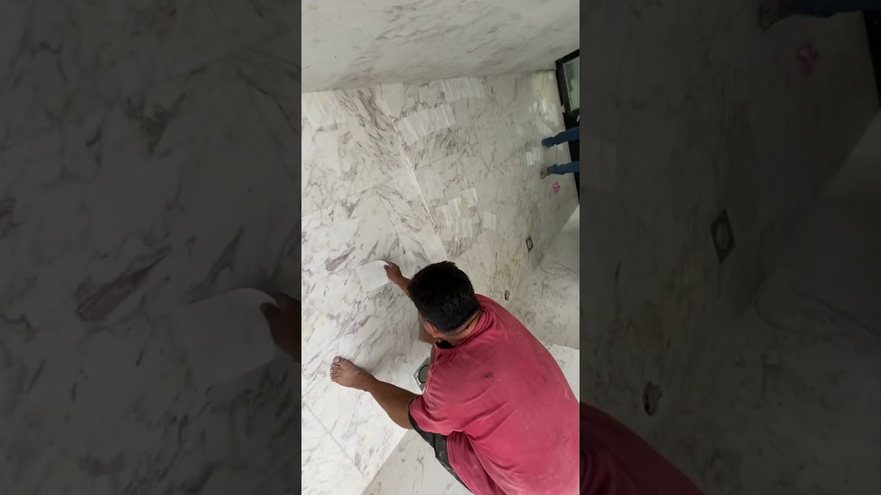Marble workers' work of removing stains. Deep rust stain removing on Austin white Italian marble