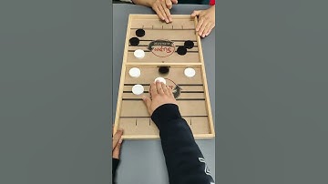 Super winner! Whoever clears the board first wins👌Sling Puck Game #shorts #2024