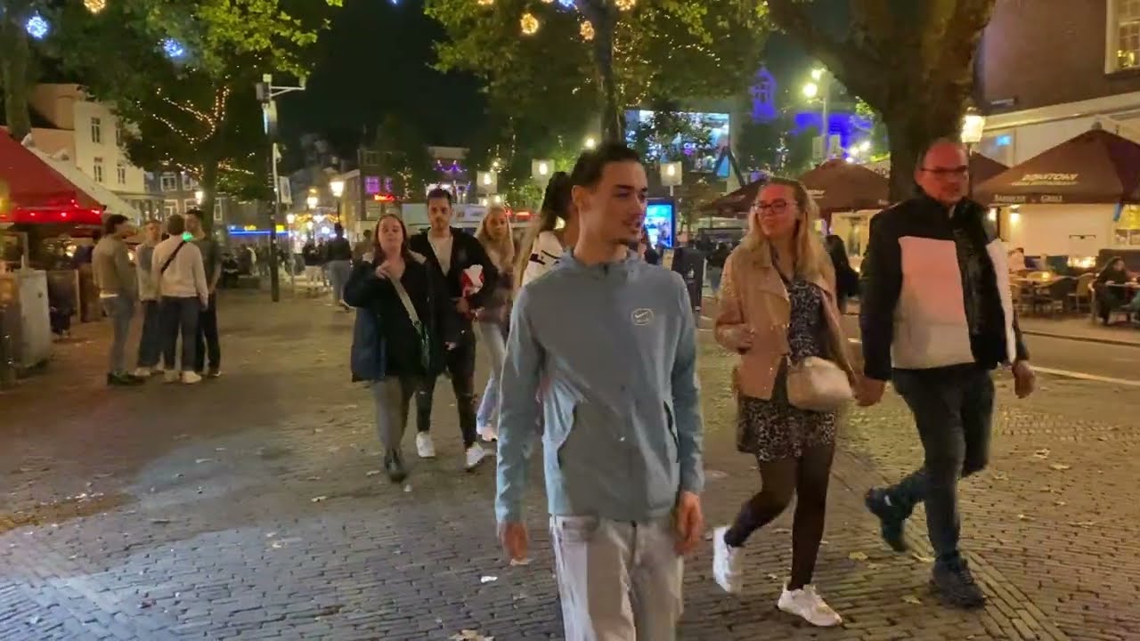 Netherlands. Happy people spend the night in Amsterdam