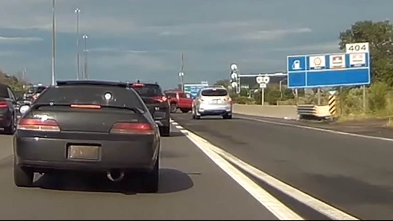 SUV jumping traffic queue gets blocked by pickup truck - YouTube