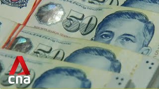 Singapore tightens monetary policy