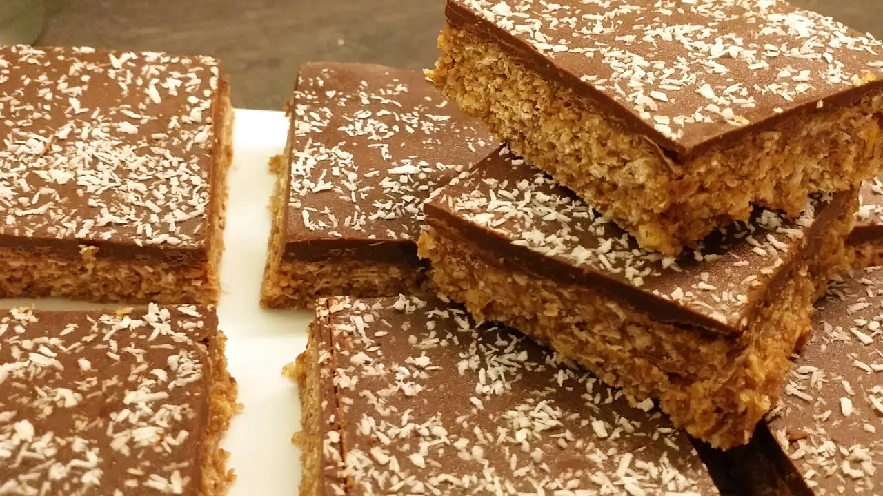 مربعات الشوفان بزبدة الفول  السوداني بدون فرن.  peanut butter granola bars