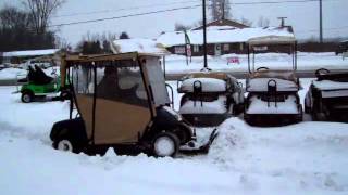 Golfcart snow plow golfcar snowplowing