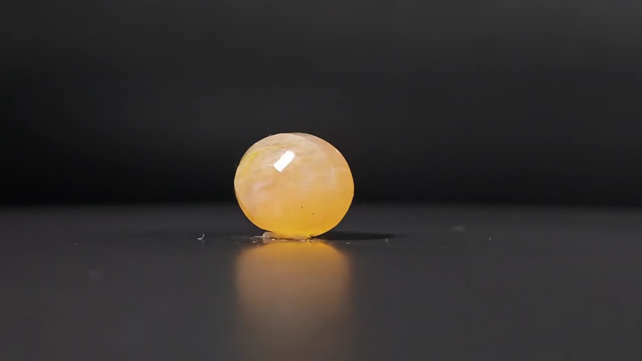 16.09 Carats Natural Yellow Sapphire Cirtificate No. AK1309161112