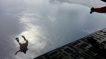 Slow Motion- 106th Rescue Wing Pararescuemen jumping from a C-17 Globemaster