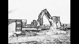 Loading a shipping container with logs