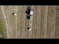Трактор в поле съемка с квадрокоптера