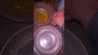 Water in the Bowl: Preparing for a Rustic Outdoor Cook (Focuses on the action and setting)