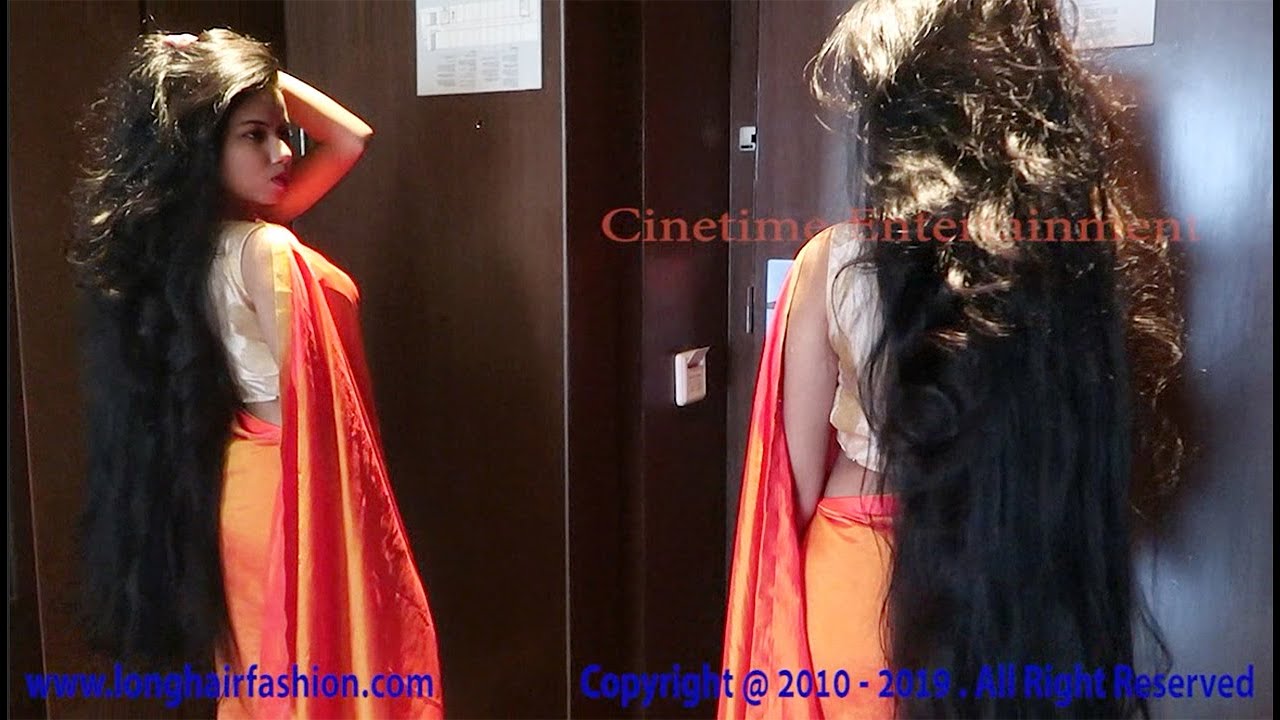 Luxurious Long Hair Model Wearing Beautiful Orange Saree | Indian Traditional Saree