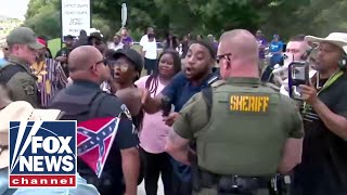 Tensions ERUPT outside courthouse amid track meet murder trial