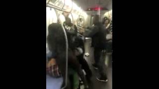 Man smacks the soul out of girl on the NY Subway (Guile Theme Edition)