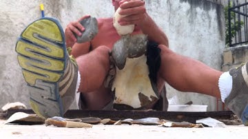 Banned flintknapping:  Stone on Stone Indirect Percussion Blade Spalling - Between Knees