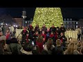 The Alexandria Choral Society performs “O Tannenbaum.”