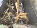 Wood waste grinding machine
