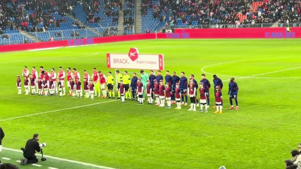 FC BASEL VS FC SION TEAMS TAKING THE FIELD 