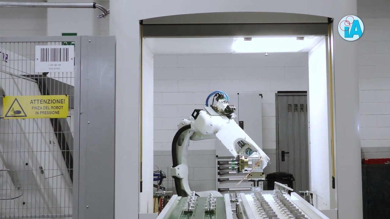 Unica Loading- Asservimento macchina CNC Biglia con robot Yaskawa- Automazioni Industriali