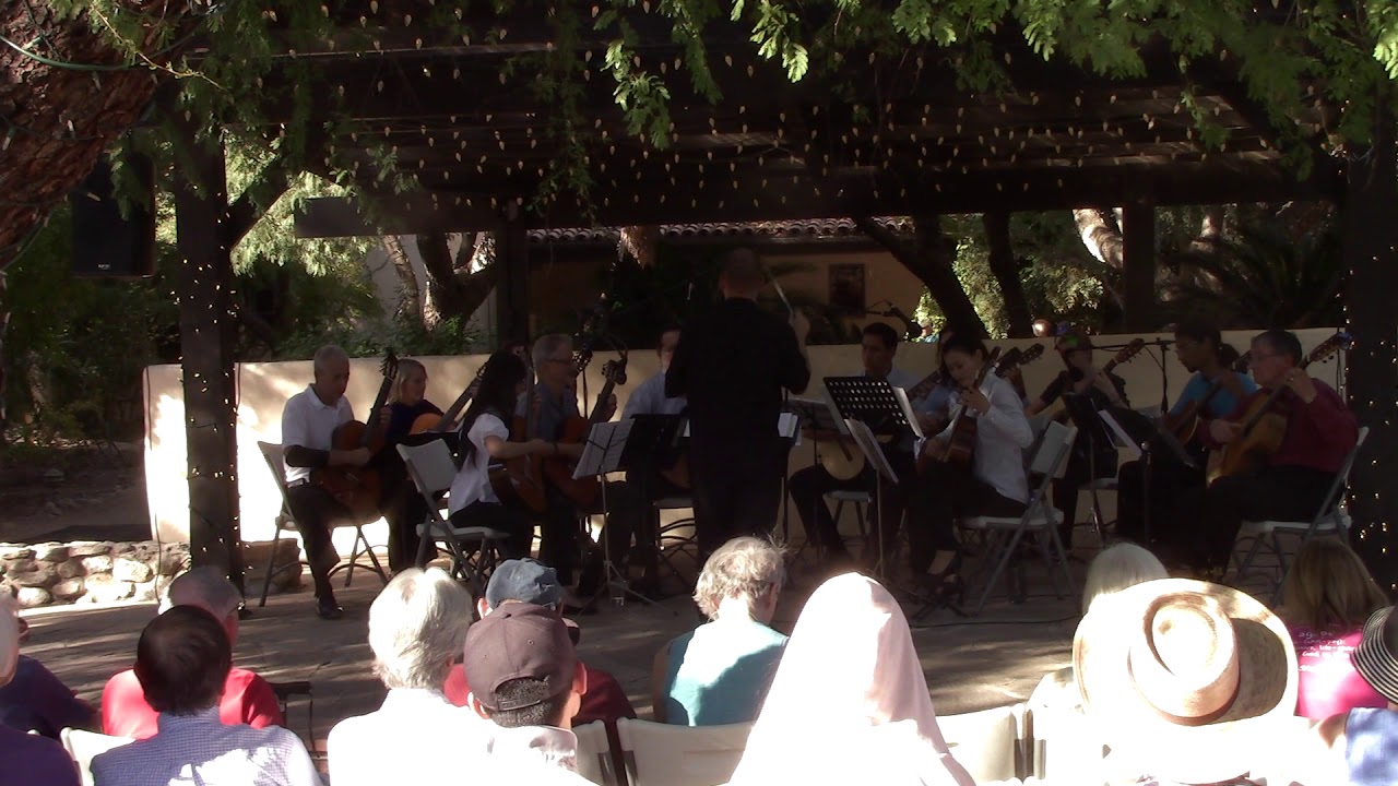 Tucson Guitar Society Orchestra performing  Gente Humilde