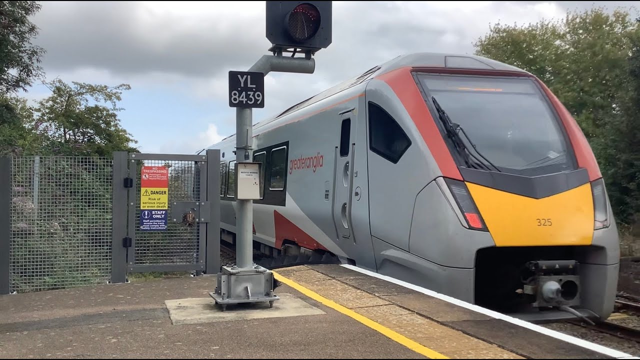 Greateranglia 755325 seen departing out of Acle station