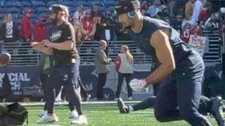 Seahawks QBs, WRs warm up