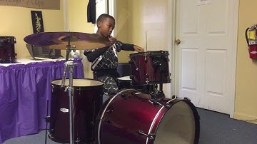 9 year old Joshua Grant on the Drumset.