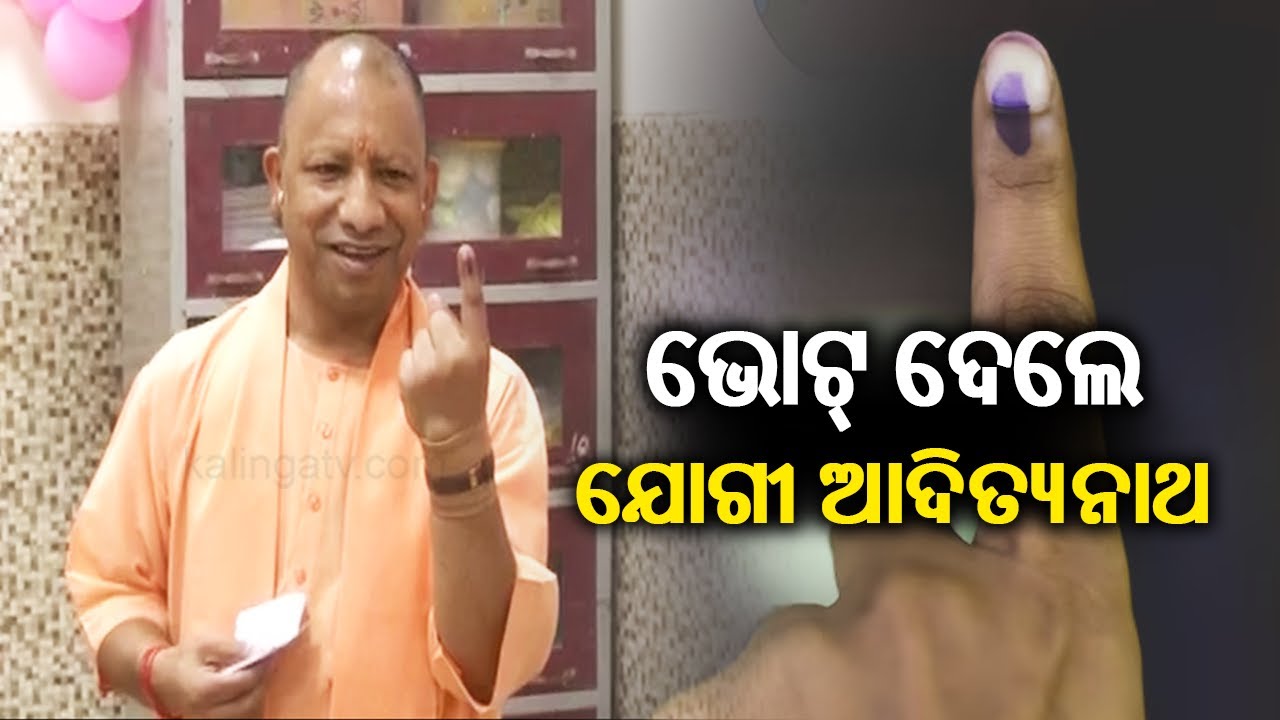 UP CM Yogi Adityanath casts his vote at a polling booth in Gorakhnath ...