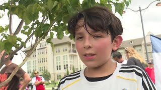 Young England fans welcome the Three Lions to Kansas City