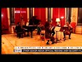 Condoleezza Rice performs on the piano at Buckingham Palace for Queen Elizabeth II