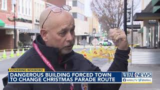 Century-old building's lean shifts Roxboro parade route