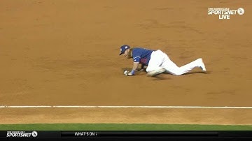 CWS@LAD: Turner dives to snag a grounder at third