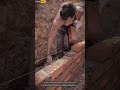 Workers Building Walls Using Bricks for Strong and Durable Construction Structures