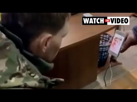 Captured Russian soldier sobs on phone to his mum