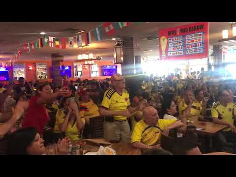 <p>With minutes left in the game, Noches of Colombia patrons wait anxiously to see the outcome.</p>