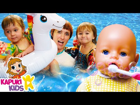 Baby Annabell & baby dolls at the swimming pool. Kids playing toys & family fun video for kids.