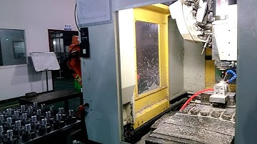 CNC Drill Tap Center Working With Robot