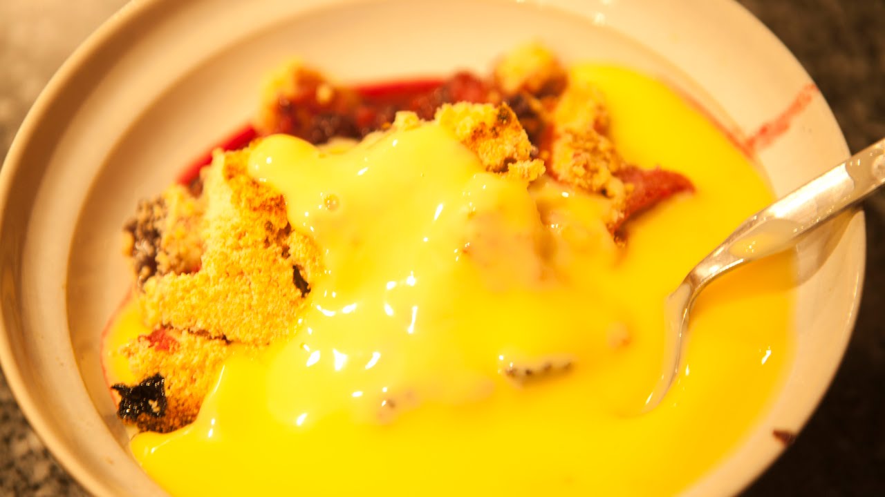 Cooking Apple and Blackberry Crumble with Custard