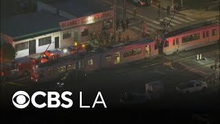 1 person hurt after vehicle collides with LA Metro train