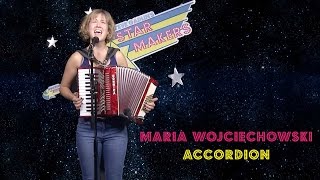 Maia Wojciechowski plays the accordion