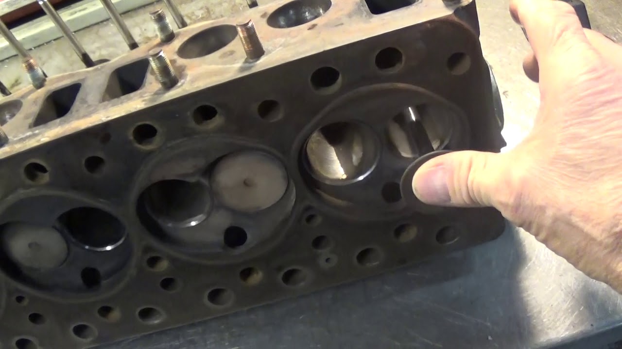 bronze exhaust guide problem in cast iron heads