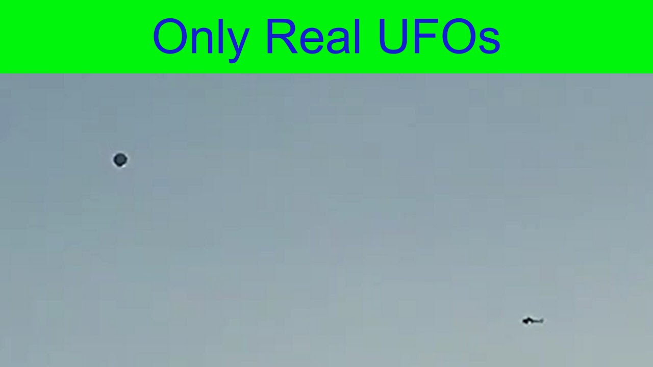 The helicopter flies around UFO at a considerable distance. Los Angeles, California. 8|28|2017. The helicopter flies around UFO at a considerable distance. Los Angeles, California. 8|28|2017.